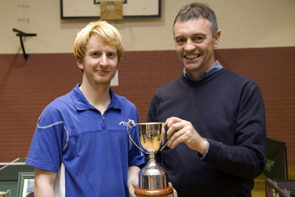 Gavin Rumgay receiving Top 12 trophy from Martin Fleming